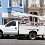 Close-up of a fleet vehicle engine undergoing routine maintenance