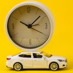 Car with a clock on the roof of it